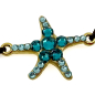 Preview: Ekaterini Freundschaftsarmband, Starfish, Seestern, türkise Swarovski Kristalle an brauner Kordel und goldenen Akzenten, Detail Seestern